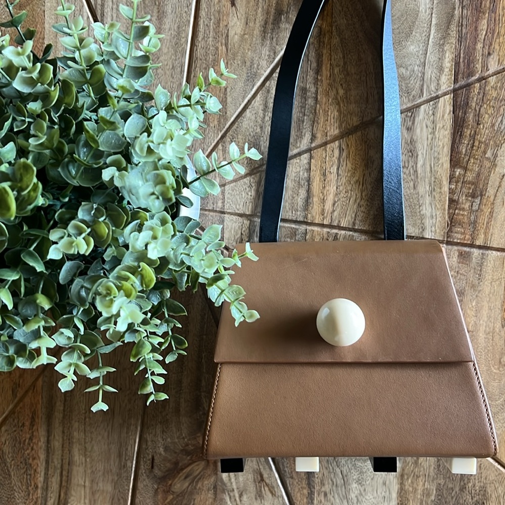 MATTER MATTERS GALLERY
MINI TRAPEZOID SHOULD BAG - BROWN Leather Crossbody Bag - Picture 9 of 16